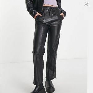 Tall faux leather peg pant in black. Sz 12 never worn.